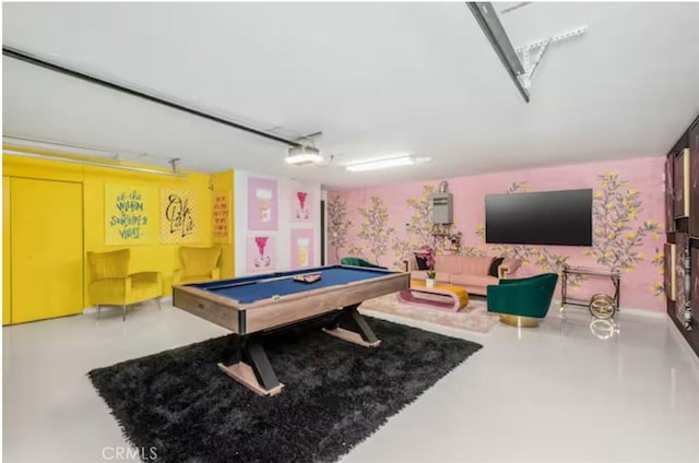 rec room with billiards and concrete flooring