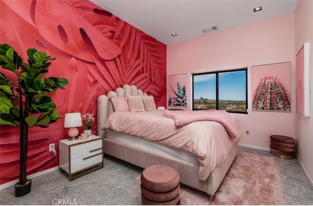 bedroom with light colored carpet