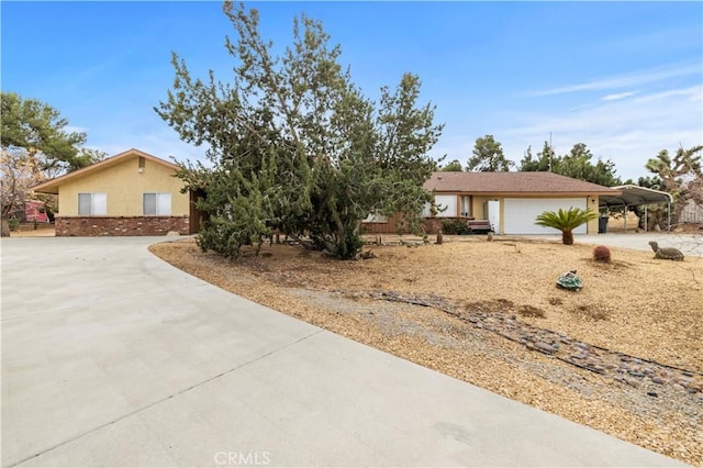 ranch-style house featuring a garage