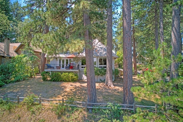 view of front of home featuring a wooden deck