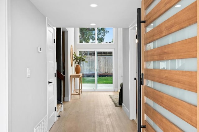 doorway to outside featuring light hardwood / wood-style flooring