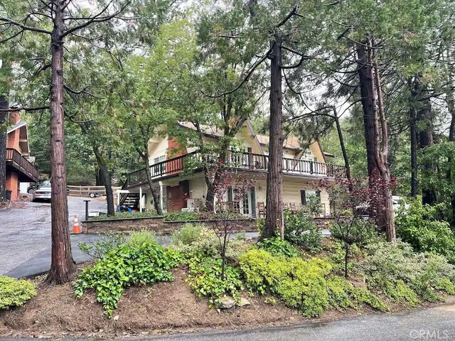 view of front of property featuring a deck