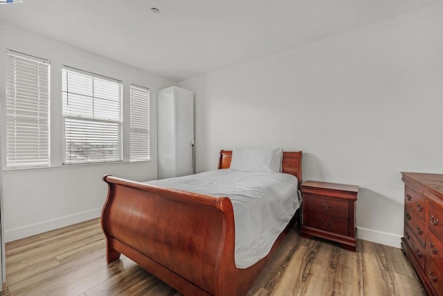 bedroom featuring hardwood / wood-style flooring