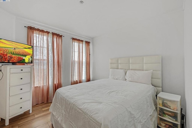 bedroom featuring light hardwood / wood-style flooring