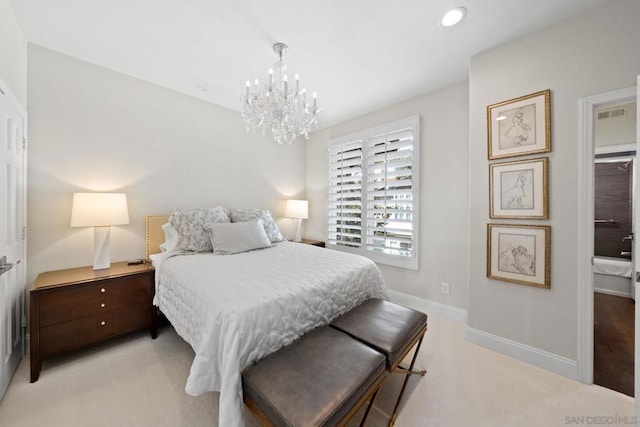 bedroom featuring an inviting chandelier