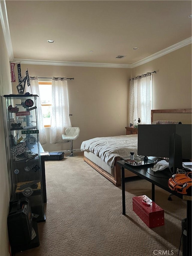 carpeted bedroom featuring crown molding