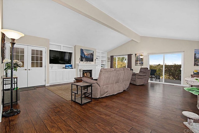 living room with lofted ceiling with beams, a brick fireplace, and dark hardwood / wood-style flooring