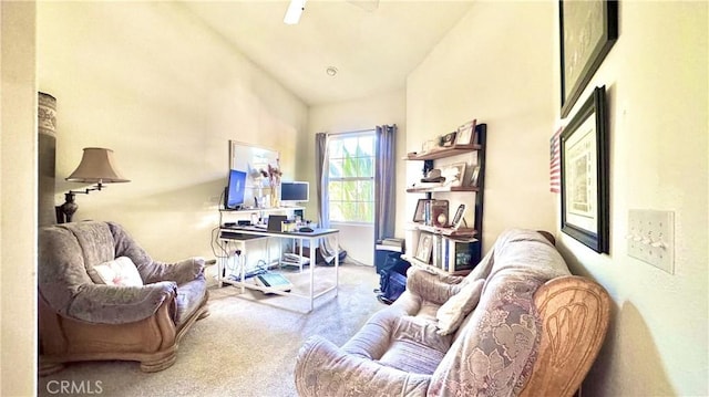 carpeted office space with high vaulted ceiling