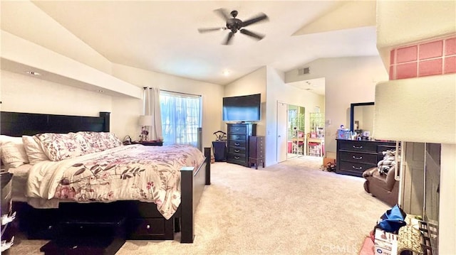 bedroom with vaulted ceiling, light colored carpet, and ceiling fan