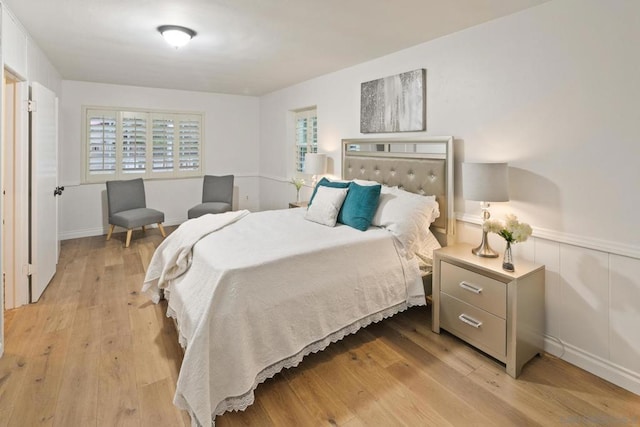 bedroom featuring light hardwood / wood-style floors