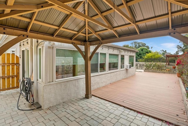 deck with a gazebo and a patio