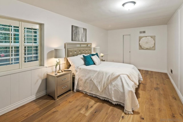 bedroom featuring light wood-type flooring