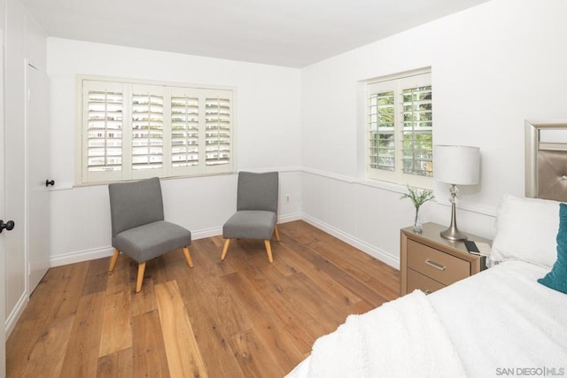 bedroom with light hardwood / wood-style floors