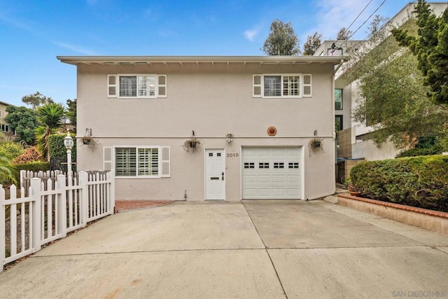 view of front of property with a garage