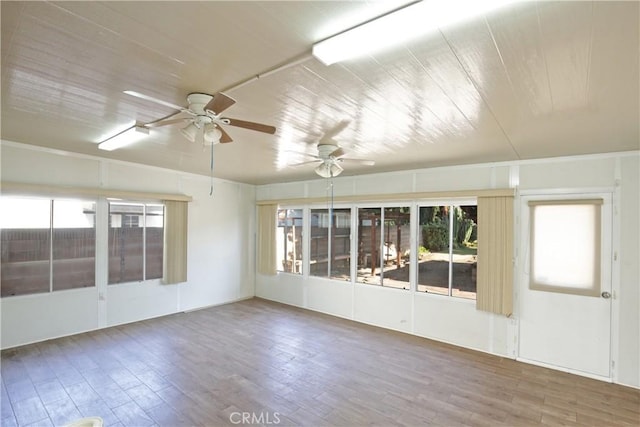 spare room with wood ceiling, ceiling fan, and hardwood / wood-style floors