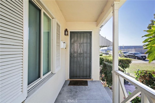 doorway to property with a balcony