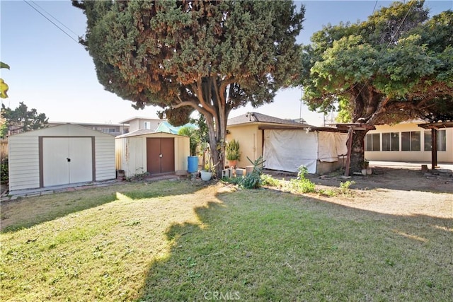 exterior space featuring a front lawn and a shed