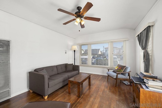 living room featuring ceiling fan and dark hardwood / wood-style floors