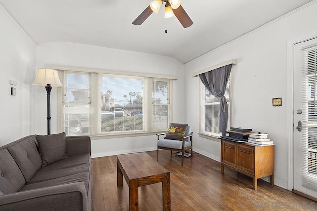 living room with ceiling fan, lofted ceiling, and dark hardwood / wood-style flooring