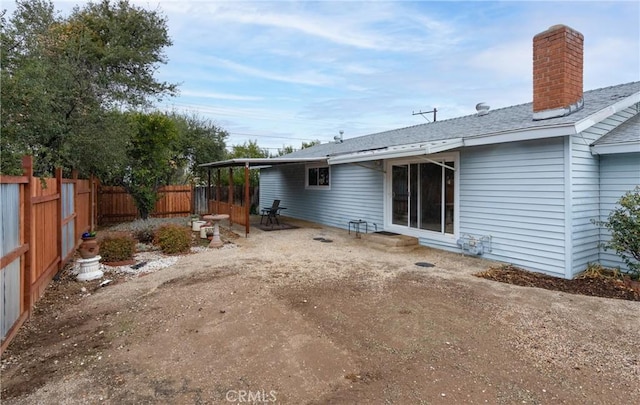 rear view of property with a patio area