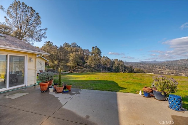 view of patio with a mountain view