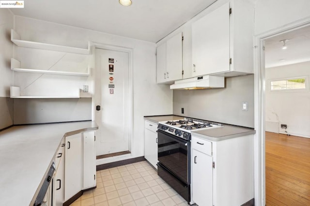 kitchen with white cabinetry and black range with gas stovetop