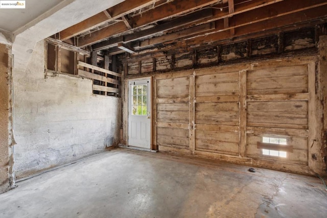 miscellaneous room with concrete flooring