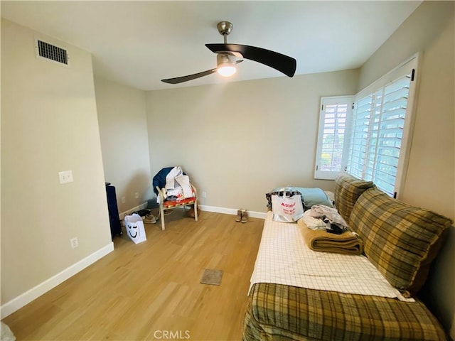 bedroom featuring ceiling fan and light wood-type flooring