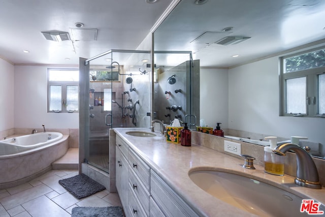 bathroom with crown molding, vanity, tile patterned floors, and plus walk in shower