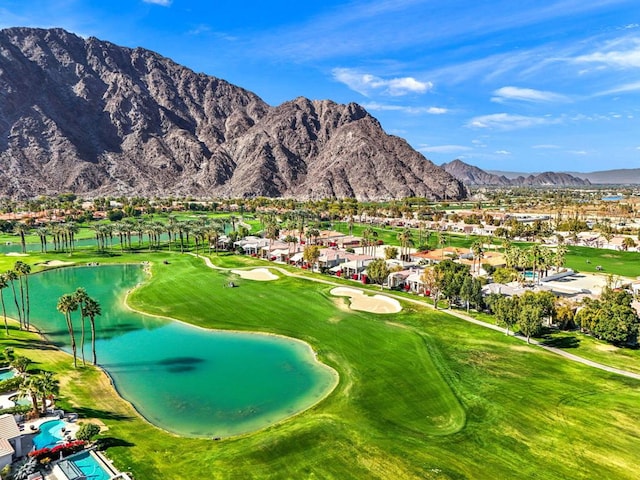 view of community featuring a water and mountain view