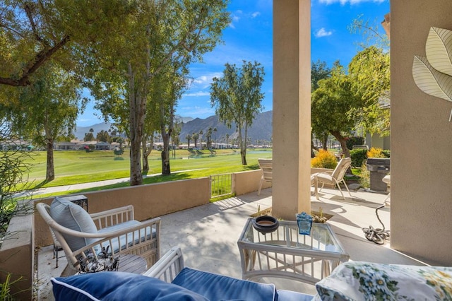 view of patio featuring a mountain view