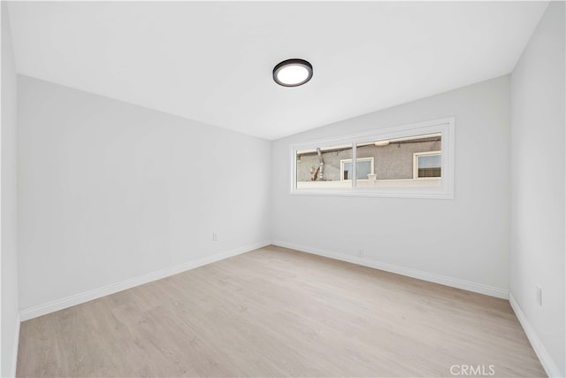 unfurnished room with light wood-type flooring