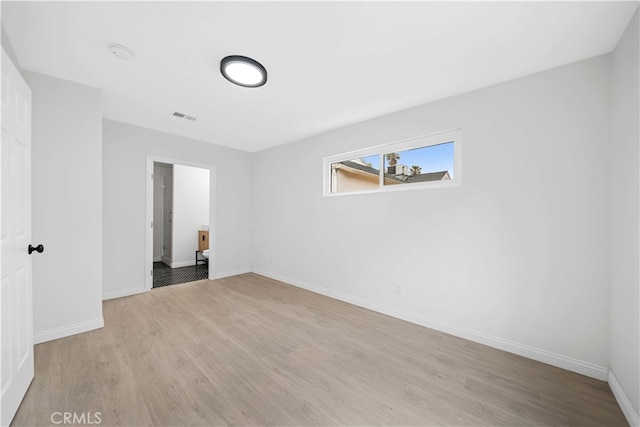 empty room featuring light wood-type flooring