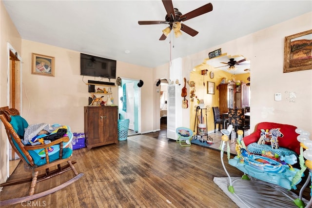 interior space with hardwood / wood-style flooring and ceiling fan