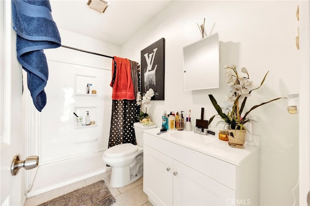 bathroom featuring tile patterned flooring, vanity, toilet, and a shower with shower curtain