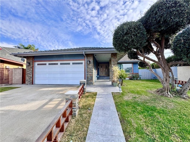 single story home featuring concrete driveway, an attached garage, fence, stone siding, and a front lawn