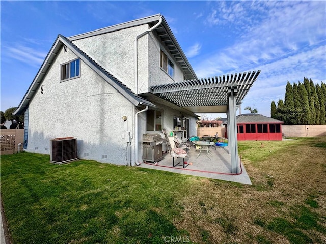 back of property with a patio, stucco siding, central AC unit, crawl space, and a fenced backyard