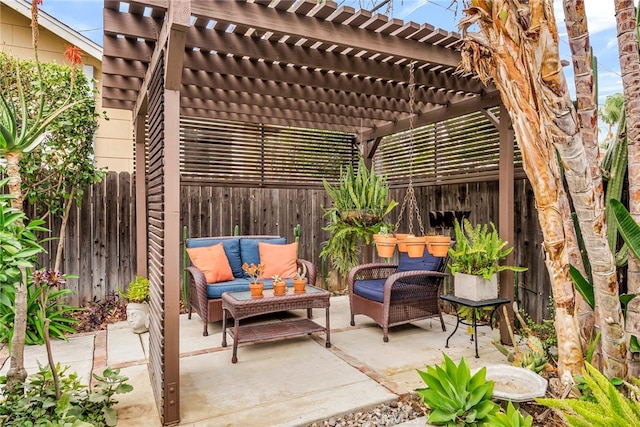 view of patio featuring an outdoor hangout area and a pergola