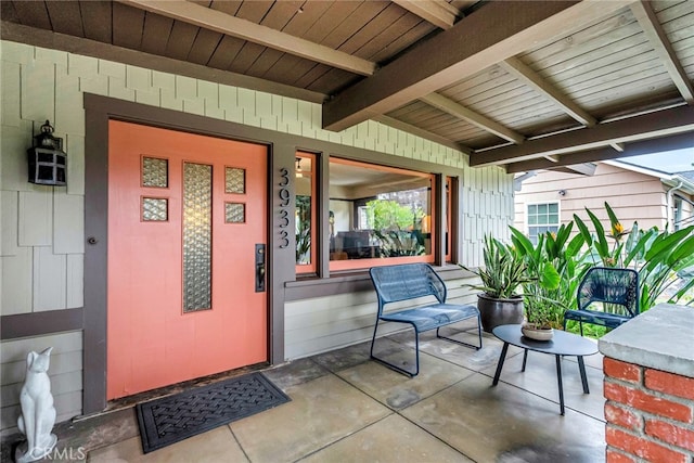 property entrance with a porch