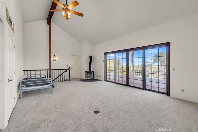 2572 Sunset Dr, Riverside, CA 92506 - interior space featuring light carpet, beam ceiling, high vaulted ceiling, and ceiling fan