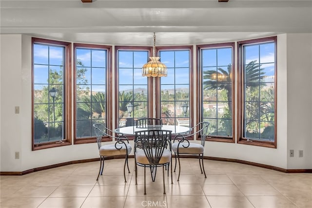 2572 Sunset Dr, Riverside, CA 92506 - sunroom / solarium featuring an inviting chandelier