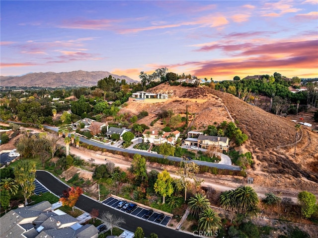 2572 Sunset Dr, Riverside, CA 92506 - aerial view at dusk featuring a mountain view