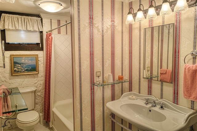 full bathroom with toilet, sink, and shower / bath combo with shower curtain