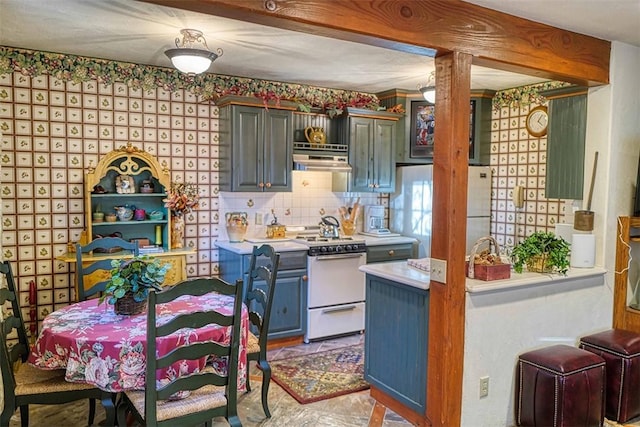 kitchen with extractor fan, refrigerator, kitchen peninsula, white range with electric cooktop, and backsplash