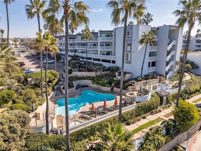 view of swimming pool featuring a patio area