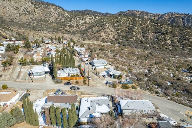 drone / aerial view featuring a mountain view