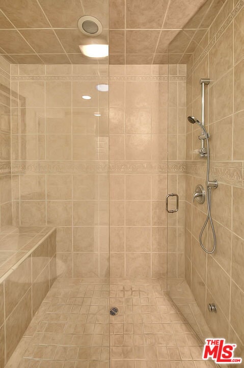 bathroom featuring an enclosed shower