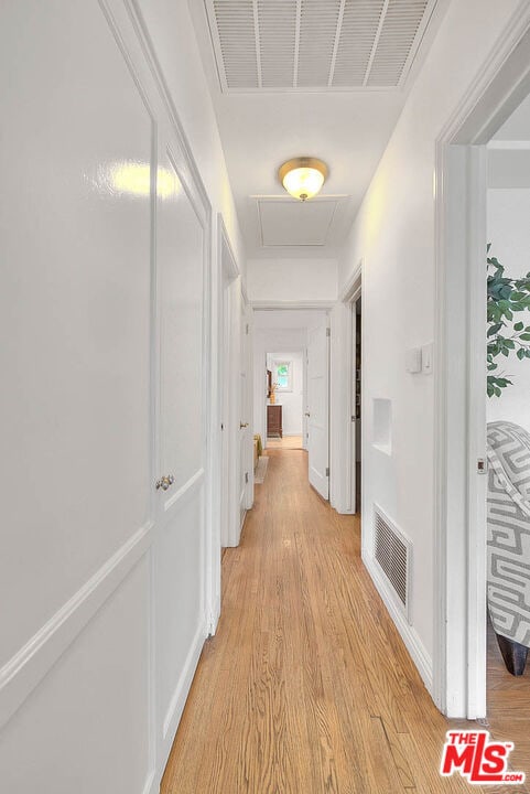 hall featuring light hardwood / wood-style flooring