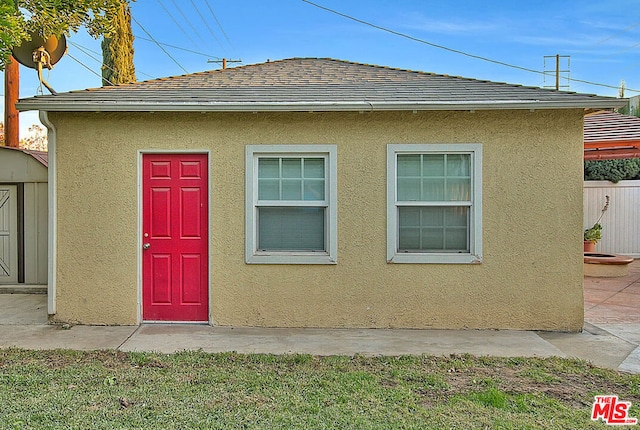 doorway to property with a patio area