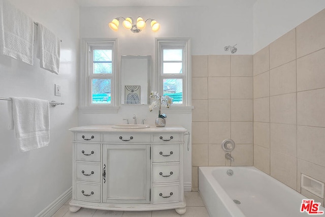 bathroom with vanity and a bathing tub